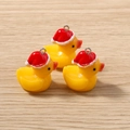 Three cute yellow resin ducks with red Santa hats for DIY jewelry pendant making - Red Santa Hat Duck Style