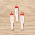 Macro detail of alloy medical thermometer pendants with 37.0°C enamel and gold plating - 10 Pieces Pack / Thermometer