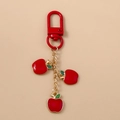 Chic red apple keychain with three fruit charms and durable gold-tone snap hook for bags - Red Apple