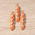 Realistic resin baguette bread pendants with metal rings on light wood background - Baguette Bread / 10 Pieces Pack