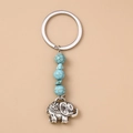 Vue détaillée du porte-clés argenté avec perles turquoise et breloque éléphant - Éléphant Turquoise
