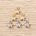Macro shot of gold and silver star pendants with rhinestones for DIY jewelry making - Mixed Color Rhinestone Small Star / 5 Pieces