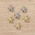 Detailed close-up of starfish pendants with sparkling rhinestones in gold and silver finish - Mixed Color Double Rhinestone Star / 5 Pieces
