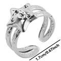 Detail view of adjustable stainless steel ring with hollow star and textured band - Steel