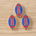 Three enamel American football charms for jewelry making on light wood background - 10 Pieces Pack / Navy Blue and Red