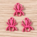 Detail of pink alloy spider charms with matte finish for DIY jewelry making - 10 Pieces Pack / Rose Red