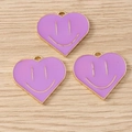 Detailed view of purple heart-shaped enamel charms with golden smiley face accents - 10 Pieces Pack / Purple