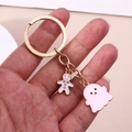 Halloween pumpkin ghost keychain with gingerbread man pendant on golden chain for bags - Pink Ghost