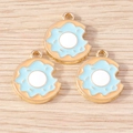 Detail of blue enamel donut charms with golden edges on light wood background - Blue Donut / 10 Pieces Pack