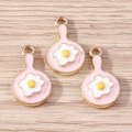 Close-up of three fried egg pan alloy charms with pink enamel for DIY jewelry making - Pink Pan Fried Egg / 10 Pieces Pack