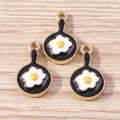 Close-up of three cute fried egg pan alloy charms with gold plating for DIY jewelry - Black Pan Fried Egg / 10 Pieces Pack