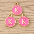 Pink enamel round alphabet charm with gold letter K and metal hanging loop, set of 3 - Letter K / 10 Pieces Pack