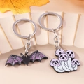 Portachiavi di Halloween in acrilico con pipistrello e funghi a forma di teschio - Combinazione di Pipistrello e Fungo