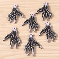 Packung Skeletthand-Anhänger für Halloween DIY Schmuckherstellung mit lila Fingerspitzen - Hand der Fatima