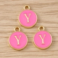 Detailed view of round pink enamel letter Y charms with golden metal frames for DIY - Letter Y / 10 Pieces Pack