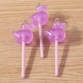 Three purple resin duck lollipop pendants with glitter and metal loops on wood background - 10 Pieces Pack / Purple