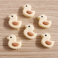 Cute resin cartoon yellow duck pendants with sandwich biscuit texture for DIY jewelry making - White