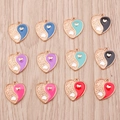 Set of colorful heart Yin Yang pendants with gold alloy frame on light wood background - Multicolor