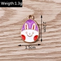 Macro detail of a purple enamel bunny egg pendant with dimensions 2.2cm and 1.5cm for DIY - 10 Pieces Pack / Purple Cartoon Rabbit (YD1080)