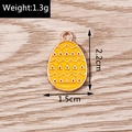 Detailed view of yellow enamel Easter egg pendant with rose gold alloy frame and measurements - 10 Pieces Pack / Yellow Wave Triangle (YD1081)