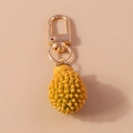 Portachiavi durian 3D realistico con punte strutturate e chiusura a moschettone dorata - Stile Durian / Giallo