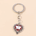 Detail of silver lace heart keychain with red butterfly pattern and black bead accent - Silver White Butterfly Heart