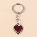 Detail of red enamel heart keychain with silver rose and gothic sunburst patterns - Silver Red Lace Heart