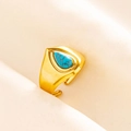 Detailed macro view of an adjustable gold ring featuring a teardrop turquoise stone - Gold Blue Stone Style (J524-G-DB)