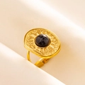 Detailed view of an adjustable gold ring featuring a black stone and sunburst engraving - Gold Base Black Texture Stone (J527-G-B)