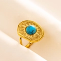 Macro view of gold bohemian ring with oval turquoise stone and sunburst engraving - Gold Base Turquoise Color Stone (J527-G-DB)