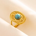 Macro shot of gold bohemian ring featuring turquoise stone and hammered metal texture - Gold Base Light Blue Stone (J527-G-LB)