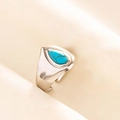 Detail of adjustable stainless steel ring featuring a pear-shaped turquoise stone - Silver Blue Stone Style (J524-S-DB)