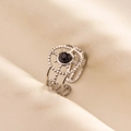 Detailed macro view of the bohemian style adjustable ring with black marble stone - Silver Black Style