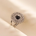 Detailed close-up of retro silver ring with black marble stone on white silk - Vintage Geometric Hollow Style (J543-S-B) / Silver-Black Stone