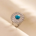 Macro shot of retro stainless steel adjustable ring with blue stone and floral carvings - Vintage Geometric Hollow Style (J543-S-DB) / Silver-Dark Blue Stone