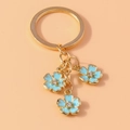 Creative Chinese style five-leaf flower keychain in gold with light blue enamel petals - Blue