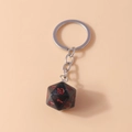 Black marble d20 dice keychain with red numbers for creative tabletop gaming fans - Black Red
