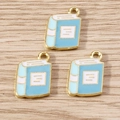 Three light blue enamel book pendants with gold alloy edges for DIY jewelry and necklaces - 10 Pieces Pack / Blue