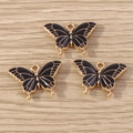 Drei elegante schwarze Emaille-Schmetterlingsanhänger mit Goldbasis für DIY-Schmuck - Schwarz