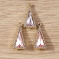 Macro detail of three pink triangle crystal pendants with gold edges and zircon inlay - 10 Pieces Pack / Gold Pink