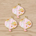 Detail of three pink enamel Chinese lantern charms with white rabbit and floral motifs - Pink Flower Bud / 10 Pieces Pack
