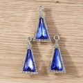 Detailed macro view of geometric triangle crystal pendants with blue stone and silver frame - 10 Pieces Pack / Silver Blue