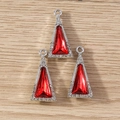 Three deep red crystal triangle pendants with silver rhinestones on a wooden background - 10 Pieces Pack / Silver Red