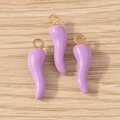 Detailed view of three purple chili pendants with gold rings for DIY jewelry making - 10 Pieces Pack / Purple