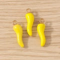Vibrant yellow chili food charms with gold rings on a natural wood surface for DIY jewelry - 10 Pieces Pack / Yellow