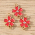Three pieces of cherry blossom jewelry connectors with red enamel and crystals on wood - 10 Pieces Pack / Red