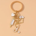 Portachiavi medico creativo con stetoscopio siringa cuore e ciondoli per cappello da infermiera - Oro Stetoscopio Cuore Siringa