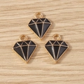 Détail de trois pendentifs en alliage en forme de diamant noir avec bordure dorée - Lot de 10 / Noir