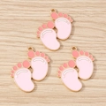 Set of three alloy cartoon footprint pendants with pink enamel for DIY jewelry making - 10 Pieces Pack / Pink