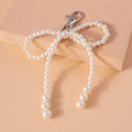 Elegante portachiavi con fiocco di perle bianche e chiusura in argento per borse - Fiocco